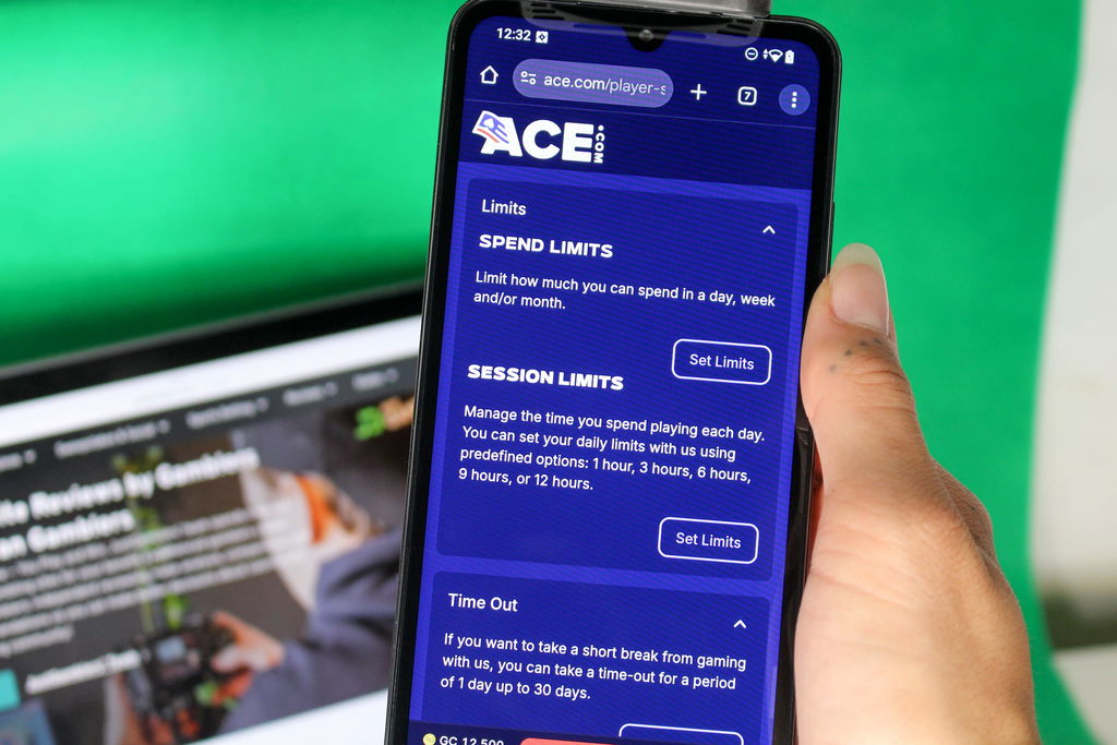 Angela Zillich holding an iPhone with the Ace casino Player Safety page loaded on the webpage.