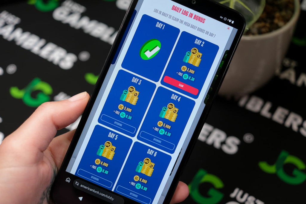 Angela Zillich holding an Android Phone with the American Luck casino Daily Login promotion page loaded on the webpage.