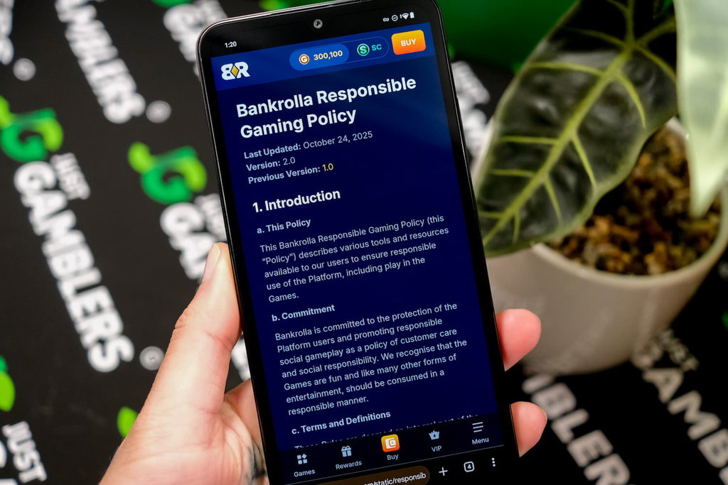 Angela Zillich holding an Android Phone with the Bank Rolla casino RGB page loaded on the webpage.