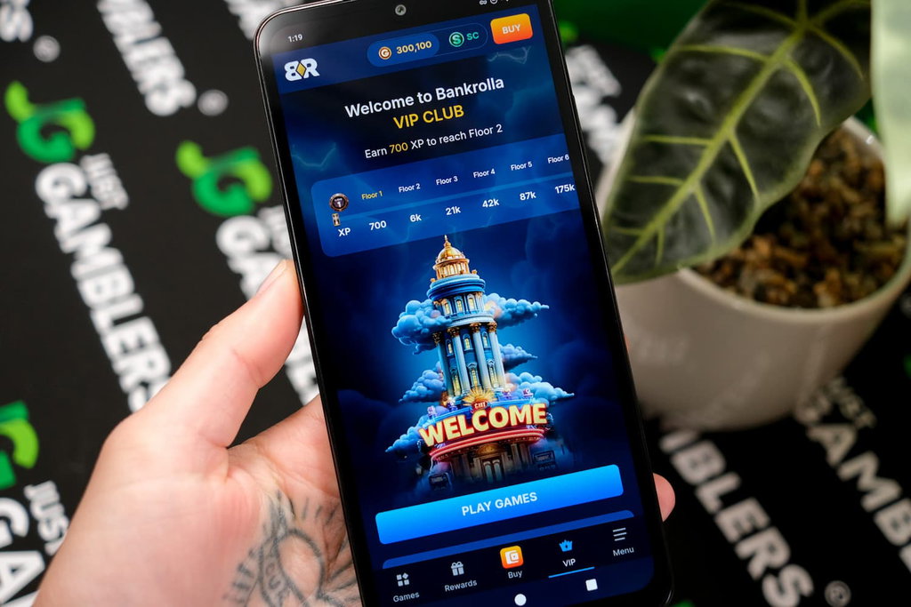 Angela Zillich holding an Android Phone with the Bank Rolla casino VIP page loaded on the webpage.