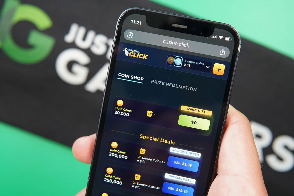 Patrik Lidin holding an iPhone with the Casino Click casino purchases page loaded on the webpage.