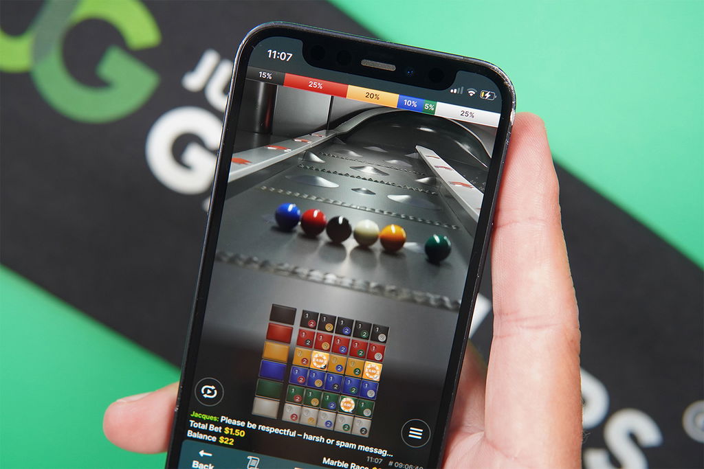 Photo of a DE online gambling site with game from Evolution loaded on the screen.