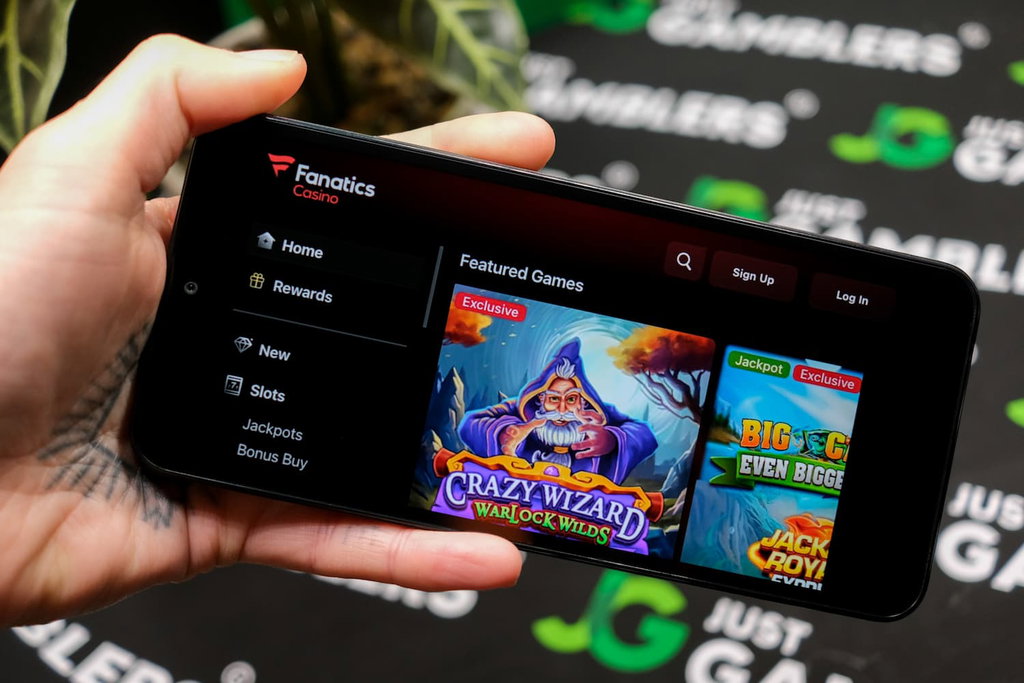 Photo of Angela Zillich holding an iPhone with Fanatics casino loaded on the screen.