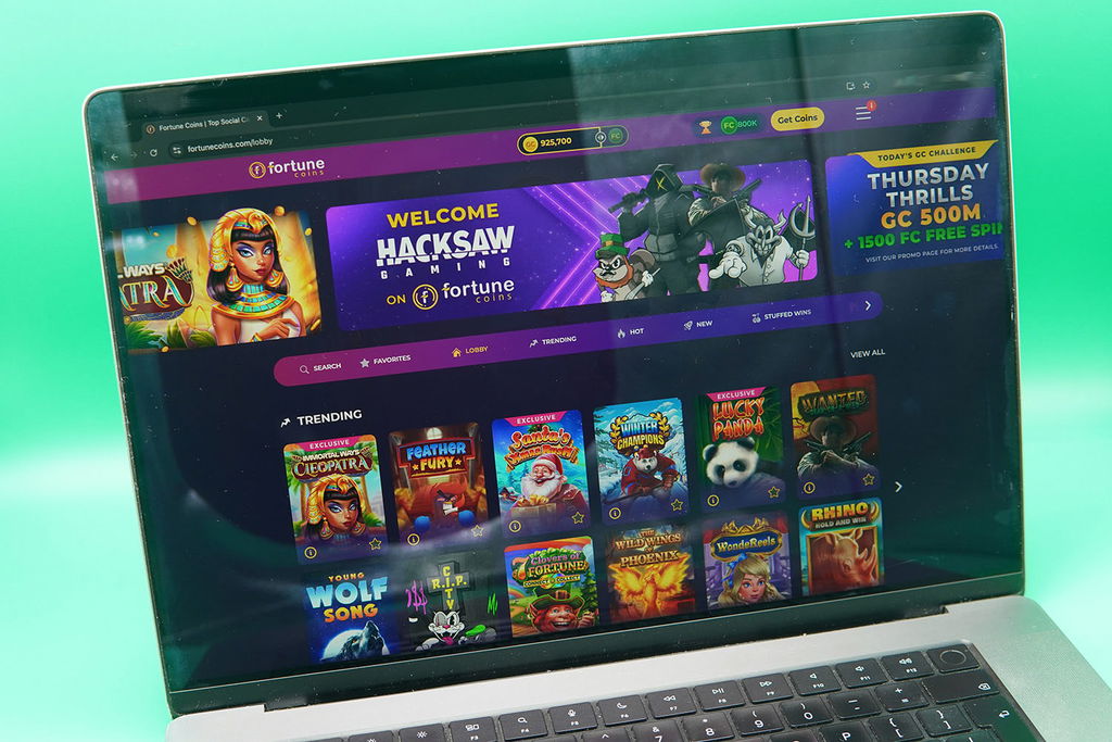 MacBook with the Fortune Coins starting page loaded in Chrome browser.