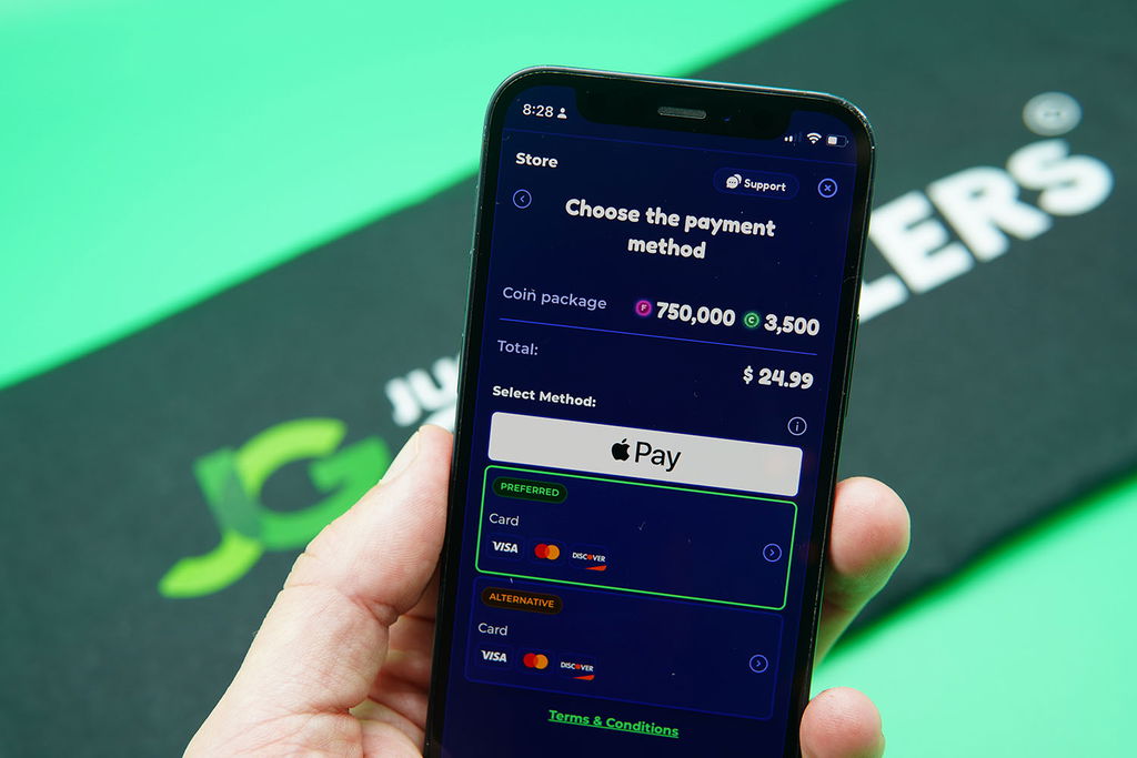 Patrik Lidin holding an iPhone showing trusted payment options on FunzCity.