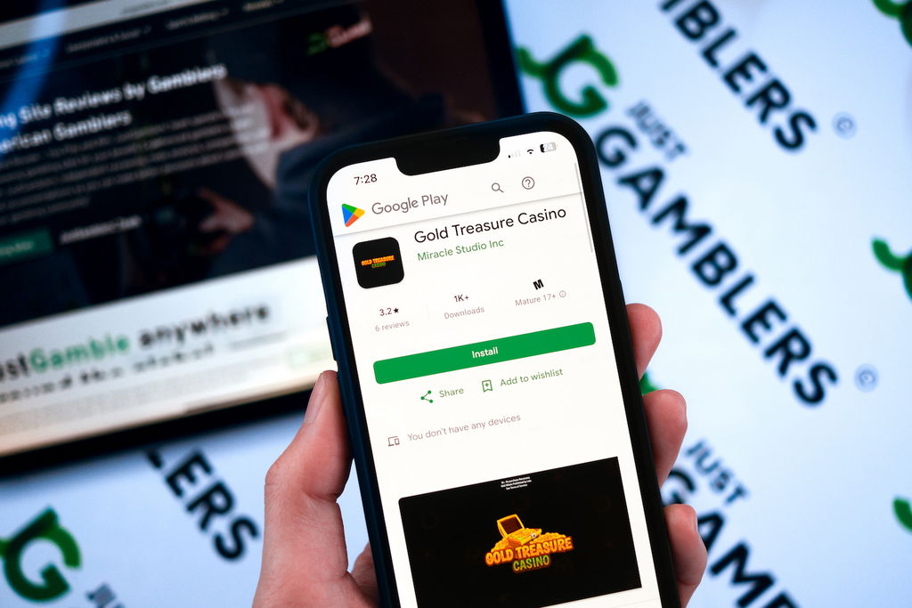 Photo of an Android mobile device with the Gold Treasure Casino App loaded.