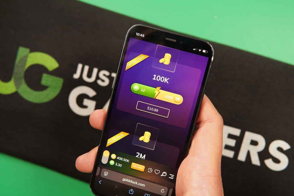 Patrik Lidin holding an iPhone with the GoldNLuck casino purchases page loaded on the webpage.