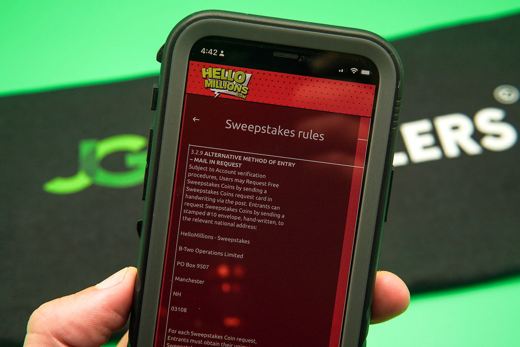 Photo of the Hello Millions AMOE instructions displayed on an iPhone.