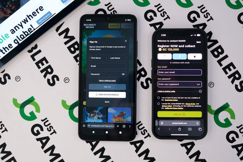 Photo of Jackpot Rabbit and Monkey Spins with respective registration page loaded on the screen.