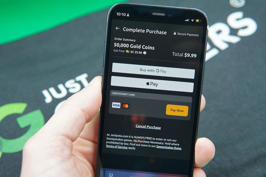 Photo of Patrik Lidin holding the Jackpota sweepstakes casino showing mobile payment options