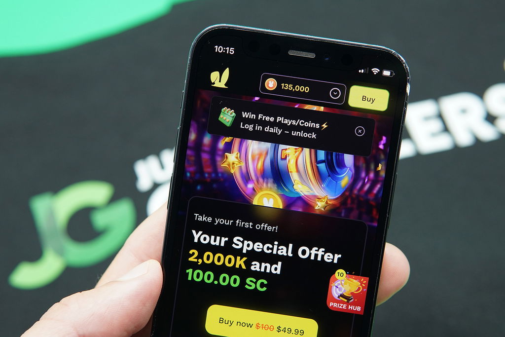 Photo of Patrik Lidin holding the new sweepstakes casino JackpotRabbit to show it looks