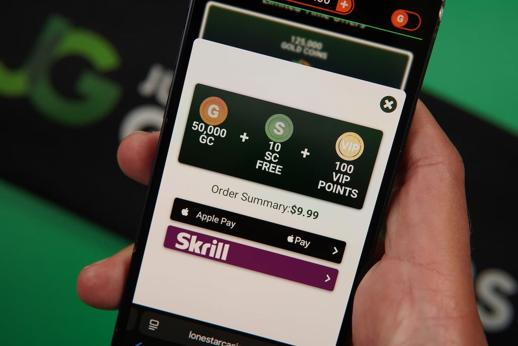 Patrik Lidin holding an iPhone with the LoneStar casino mobile payments page loaded on the webpage.