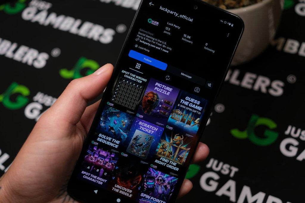 Angela Zillich holding an Android Phone with Luck Party casino Instagram page loaded on the webpage.