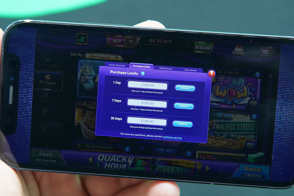 Patrik Lidin holding an iPhone with the LuckyLand casino responsible gaming tools page loaded on the webpage.