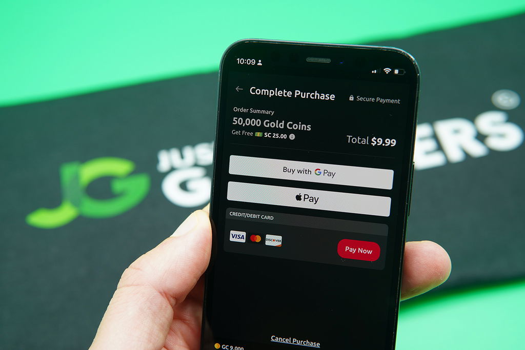 Patrik Lidin holding an iPhone when purchasing coins on McLuck casino.