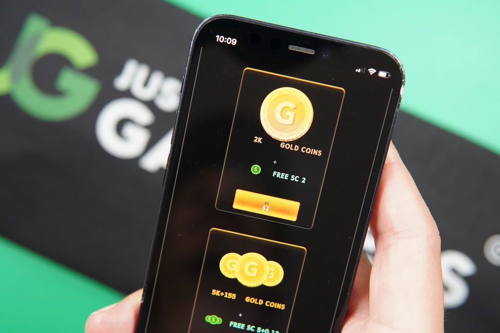 Patrik Lidin holding an iPhone with the Midas Jackpots casino purchases page loaded on the webpage.