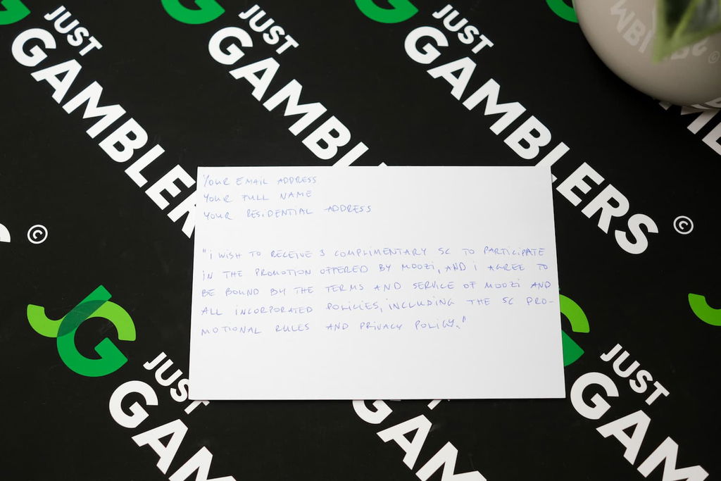 Photo of what you need to complete the Moozi mail-in request postcard.