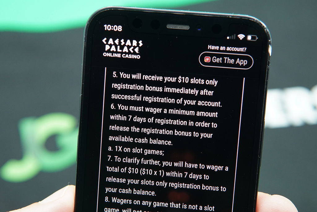 Photo of Patrik Lidin showing terms of Caesars Palace NJ no deposit bonus.