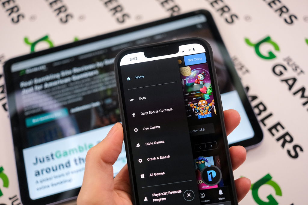 Angela Zillich holding an iPhone with the PeakPlay casino side Menu page loaded on the webpage.