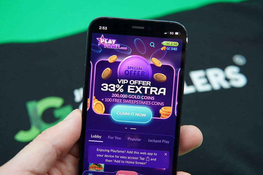 Photo of Patrik Lidin holding the new sweepstakes casino PlayFame to show it looks