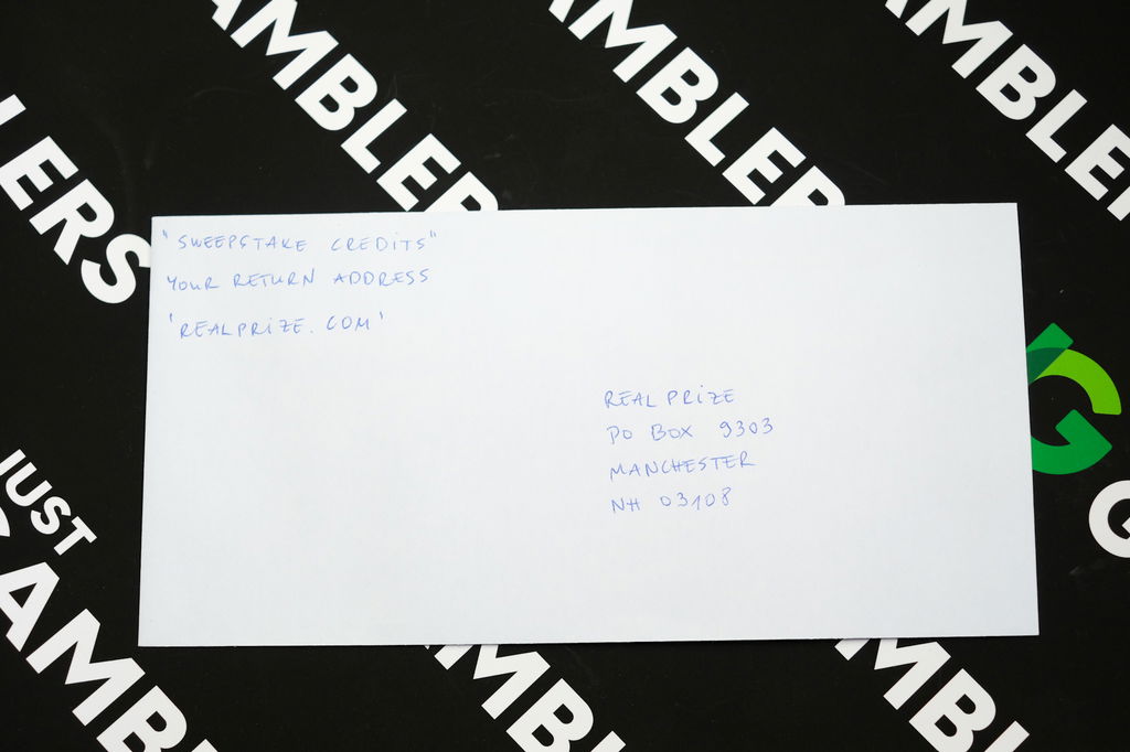 Photo of what you need to complete the RealPrize mail-in request envelope.