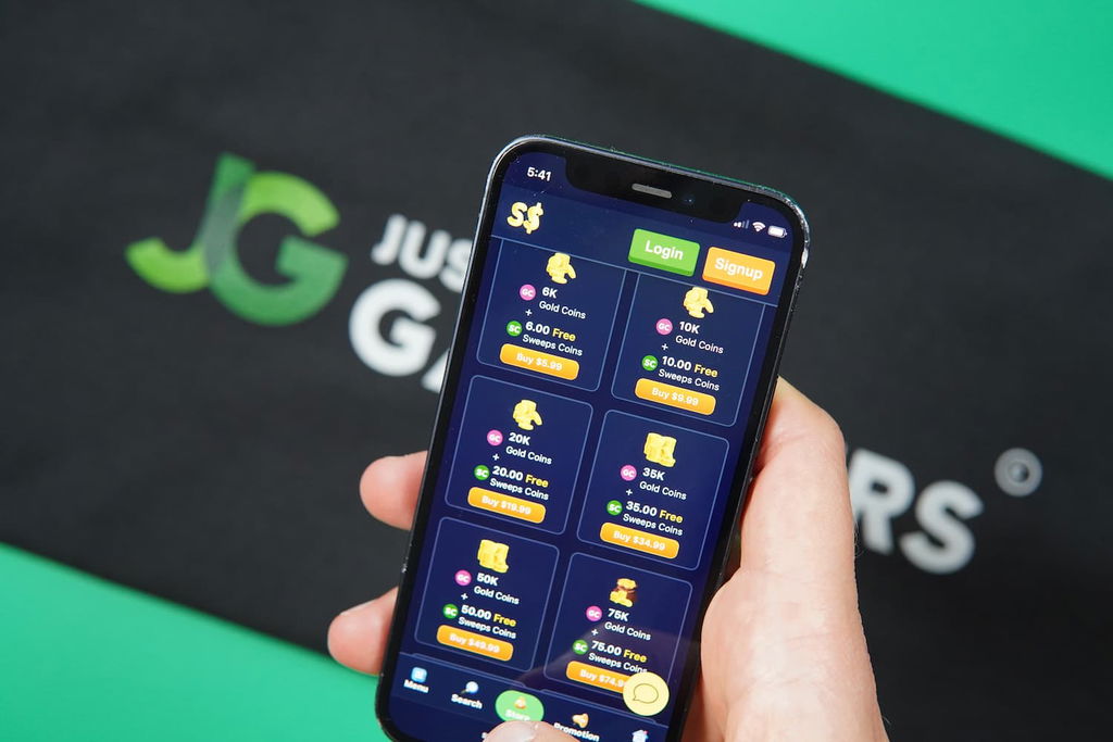 Patrik Lidin holding an iPhone with the SpeedSweeps casino coin store page loaded on the webpage.