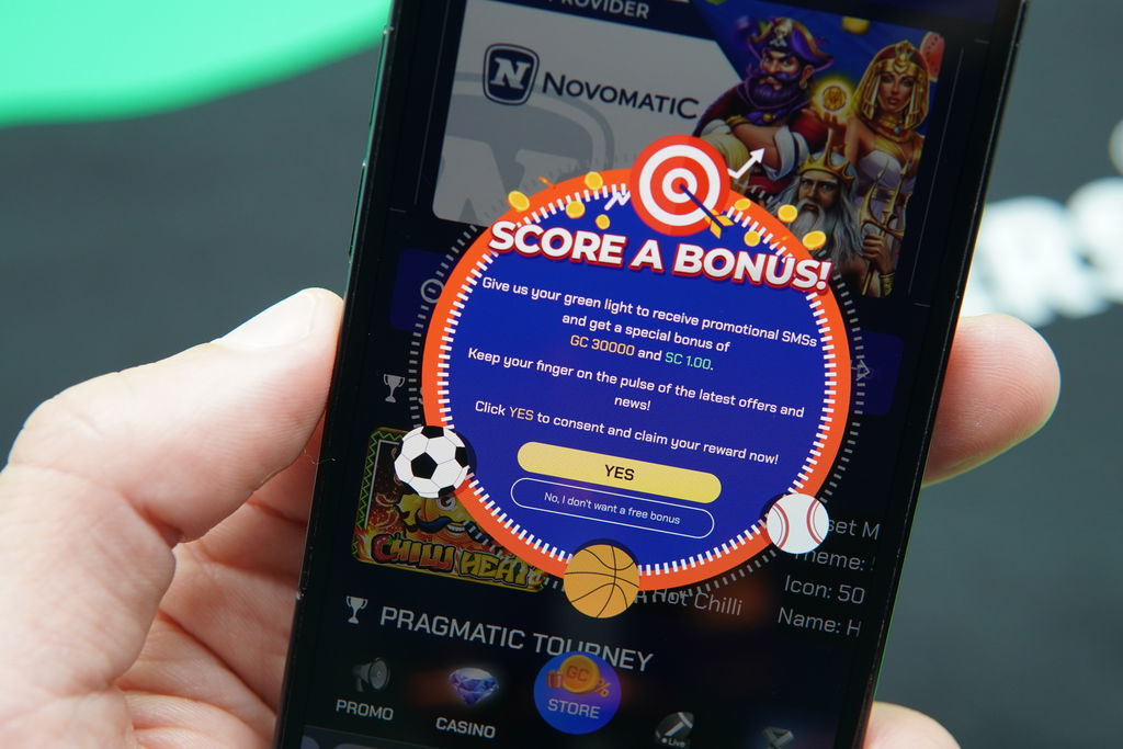 Photo of Patrik Lidin holding an iPhone showing no deposit bonus registration requirement.