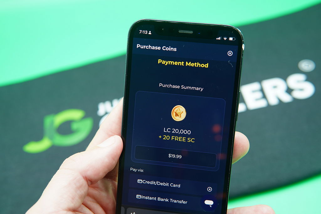 Patrik Lidin holding an iPhone when purchasing coins on Sweeptastic casino.
