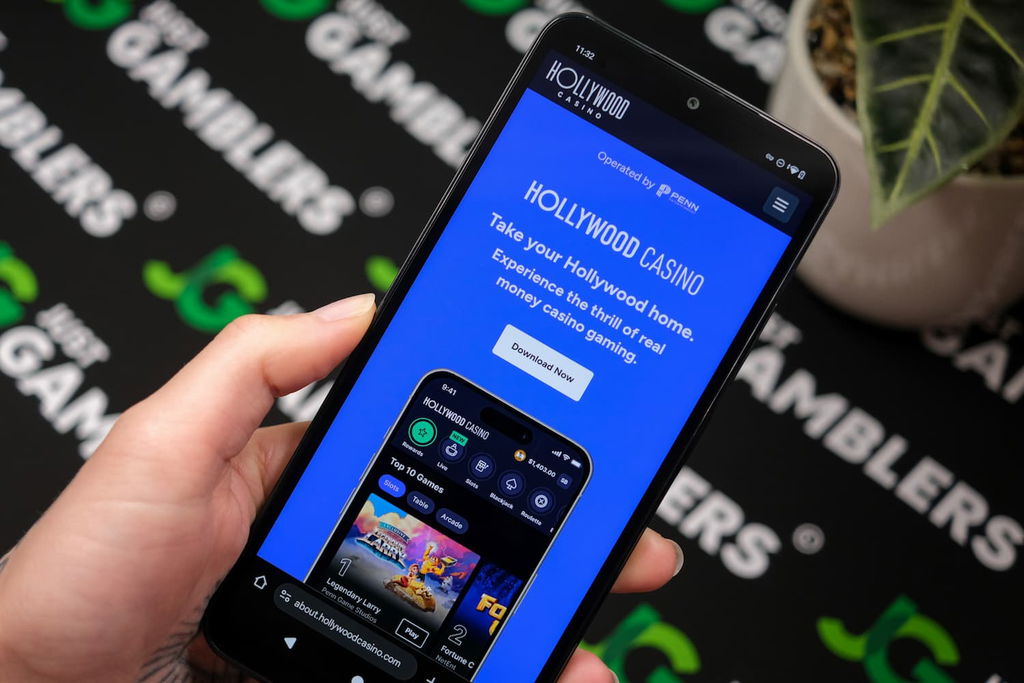 Photo of Hollywood WV online casino on an iPhone.