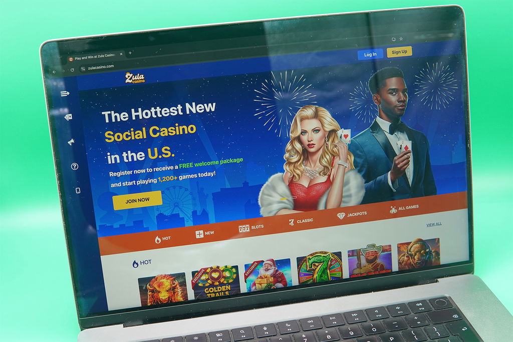 MacBook with the Zula Casino starting page loaded in Chrome browser.